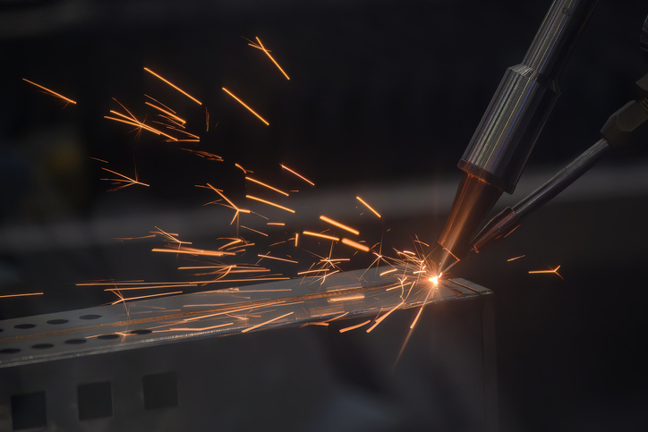 Close up scene the laser welding process by automatic system.